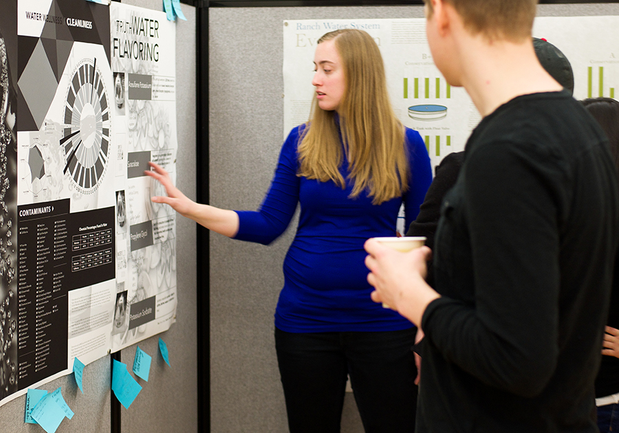 A Graphic Design student presents an infographic at the 40th annual Center for Great Plains Studies Symposium