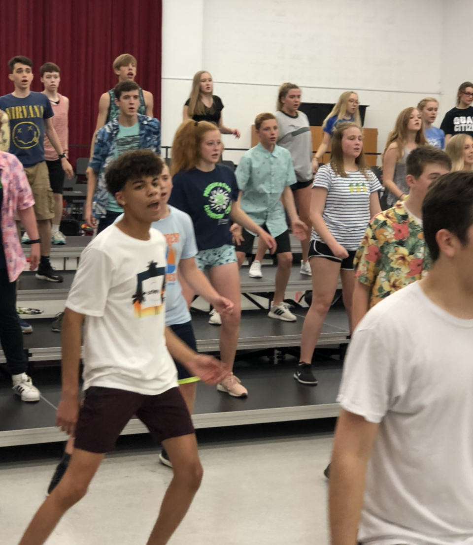 Photo of show choir camp rehearsal in the Westbrook building