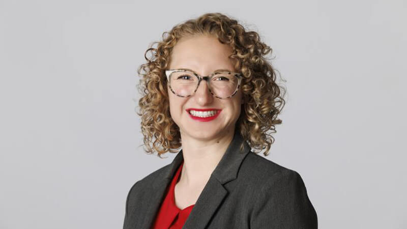 Student portrait in front of gray backdrop