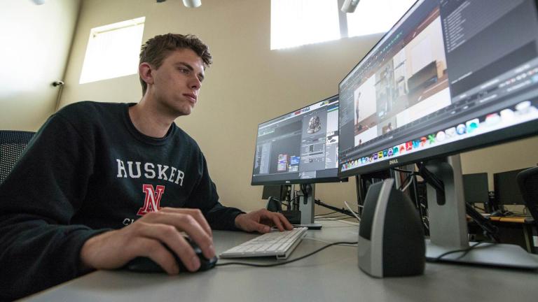 Ben working in a Film & New Media lab. 