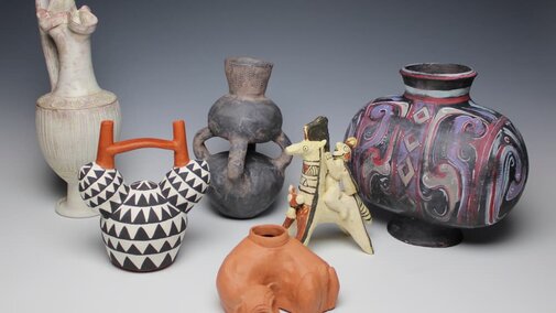 ceramics objects and vessels sit together.