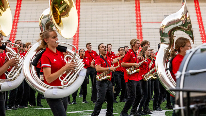 The Cornhusker Marching Band performs during its annual exhibition Aug. 18 at Memorial Stadium. The band will make its regular-season debut Sept. 16 at the stadium with pregame and halftime performances at Nebraska's football home opener against Northern Illinois. Photo by Sammy Smith.