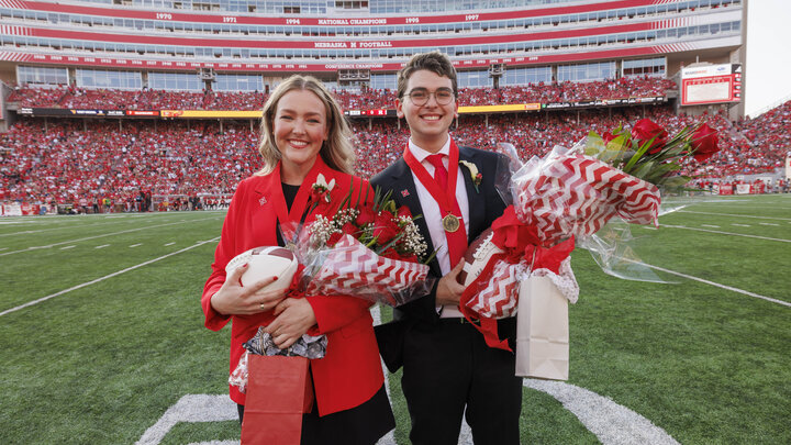 Seniors Emmerson Putnam and Jamie Smith (right) were crowned homecoming royalty during halftime of the Nebraska-Rutgers football game Oct. 5. Photo by Craig Chandler, University Communication and Marketing.