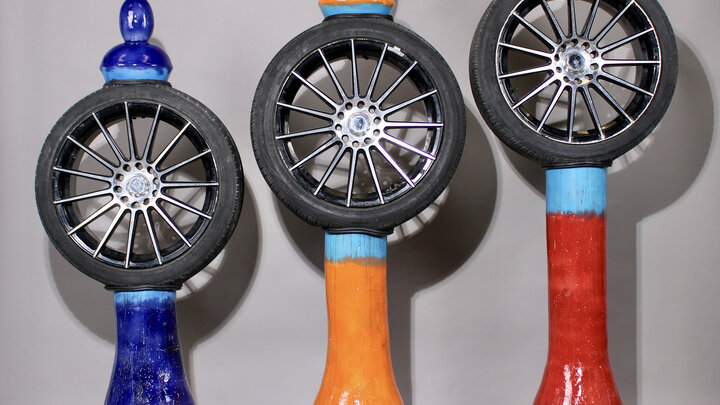 Emmanuel Asamoah, “Ahintasem” (Hidden), 2026. Earthenware, car tire, window molding, glaze. 84” x 72” x 107”. 