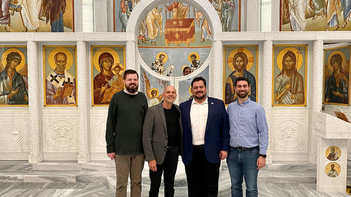 Left to right: Joel Davies, Paul Barnes, Dimitrios Katsiklis and Eleftherios Chasinidis inside the St. Nicholas Greek Orthodox Church and National Shrine last May. Courtesy photo.