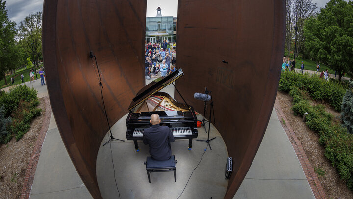 Paul Barnes performs inside Richard Serra's Greenpoint sculpture in May.