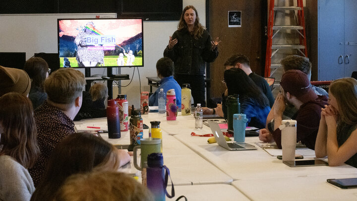 Assistant Professor of Practice in Emerging Media Arts Anna Henson speaks to cast and crew at an early table read for 