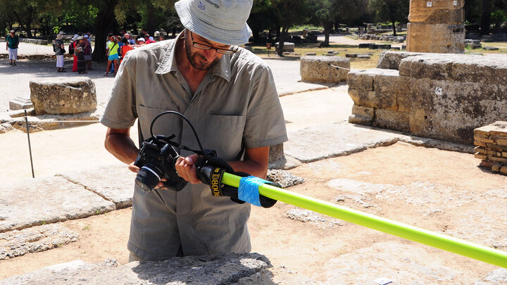 UNL's Philip Sapirstein takes digital photos of the Temple of Hera in Olympia, Greece. Sapirstein is combining digital photography with computer software to generate realistic 3-D models of ancient Greek architecture.