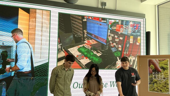 Noah Trumble, Annette Foreman and Owen Strazdas present their project titled "Mossense" at the Biodesign Challenge at the Carson Center this spring. Courtesy photo.