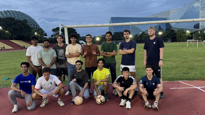 Isaac Cortes (back row, fourth from right) with other Infosys interns after a game of soccer on the Infosys Mysore campus. Courtesy photo.