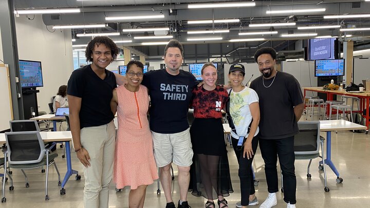 Last yearâs first cohort of the Black Public Media Residency at the Carson Center included Rae Phillips (second from left), Andrea Walls (second from right) and Johannes Barfield (right), shown with emerging media arts students Ebben Blake (left) and Kayla LaPoure (third from right) and Assistant Professor of Emerging Media Arts Dan Novy at last yearâs final presentations. The program received a $40,000 grant from the National Endowment from the Arts. 