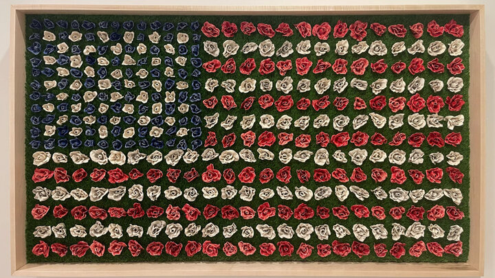 Luke Keilig, “Flag of Flowers,” ceramic sculpture, 6.7’ x 3.8’, 2024.