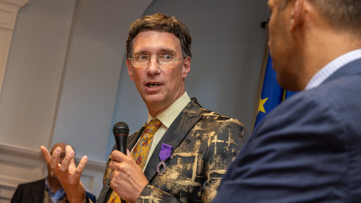 Darius Spieth speaks at the Sept. 9 ceremony at the Résidence de France in New Orleans after being decorated with the rank of Chevalier (knight) of the Ordre des Palmes académiques. Photo by Audoin de Vergnette, Consulate General of France in New Orleans. 