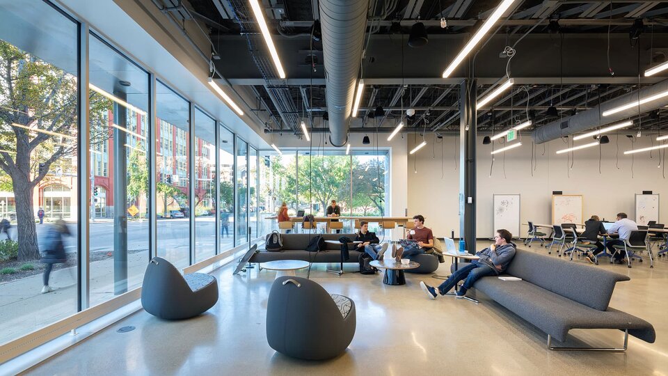 Students sit in the luxurious setting of the Center's study space.