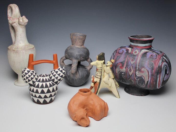 ceramics objects and vessels sit together.