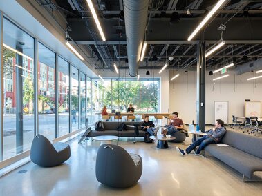 Students sit in the luxurious setting of the Center's study space.