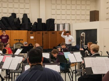 Captain Richard Viglucci conducts the UNL Wind Ensemble