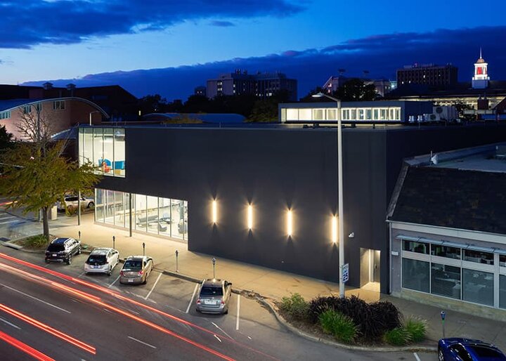 Carson Center building at night.