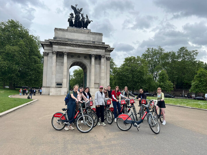 Group photo of students on bike shares in France