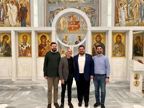 Left to right: Joel Davies, Paul Barnes, Dimitrios Katsiklis and Eleftherios Chasinidis inside the St. Nicholas Greek Orthodox Church and National Shrine last May. Courtesy photo.