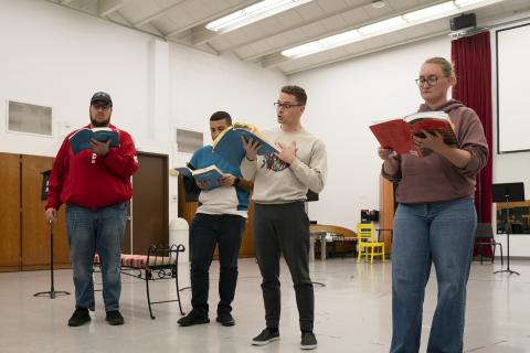 Left to right:  Noah Shannon, Joshua Pitt, Samuel Kennedy and Rachel Sweeney rehearse “The Marriage of Figaro” in Westbrook Music Building. Performances are Nov. 11 and 13 in Kimball Recital Hall. Photo by Laura Cobb.