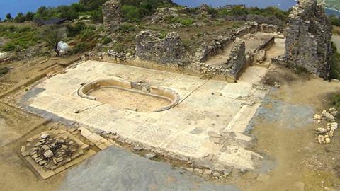 An aerial photograph of the archaeological excavation of Antiochia ad Cragum in Turkey that shows one of the mosaics uncovered at the site.