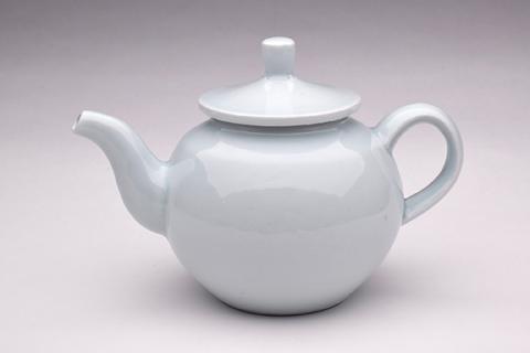 Pete Pinnell, “Teapot,” porcelain with celadon glaze, 7” x 10” x 6”, 2017.