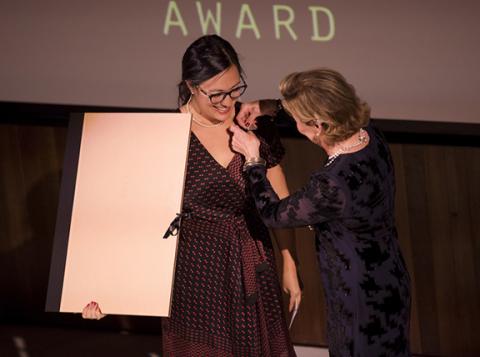 Her Majesty Queen Sonja of Norway (right) presents the Queen Sonja Print Award 2018 to Emma Nishimura on Nov. 8. Photo: Nina Rangøy / NTB scanpix.