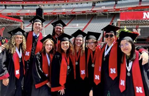 Left to right: Payton Bergkamp, Mike Rapsys, Kayla LaPoure, Mitchell Guynan, Allison Lund, Megan Whisenhunt, Madeline Schmit, Angela Walsh and Annie Wang are the first Emerging Media Arts alumni. Courtesy photo.