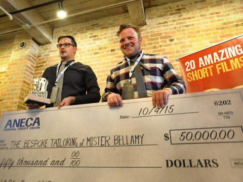 Alexander Jeffery (left) and Paul Petersen accept the $50,000 cash prize as the grand prize winner of the Louisiana Film Prize for their film, "The Bespoke Tailoring of Mister Bellamy."