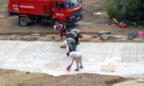 The Roman mosaic uncovered by Hixson-Lied Professor of Art History Michael Hoff's team measures approximately 25x7 meters and served as the forecourt for the adjacent large bath.