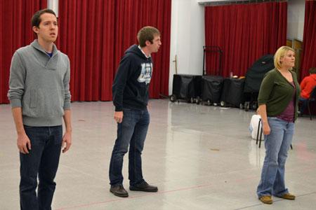 (L-R) Timothy Patrick Madden, Matthew Clegg and Talea Bloch rehearse a scene from the opera "O Pioneers!"