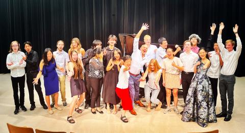 Paul Barnes (center) with students at the 2023 Lied Center Piano Academy. Courtesy photo.