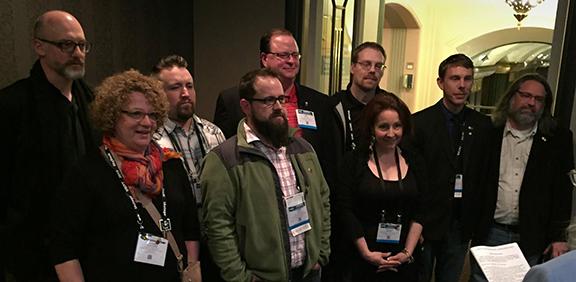 Laurel Shoemaker (2nd from left) and J.D. Madsen (third from left) are sworn into membership into the United Scenic Artists, Local USA 829, during the United States Institute of Theatre Technology’s annual conference in March in Cincinnati, Ohio.