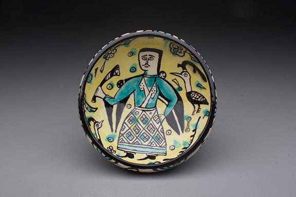 Bowl, Iran, Nishapur, 950-1100 C.E. Earthenware, polychrome decoration under transparent glaze. 9.2cm high x 20cm width. Original in the collection of the Metropolitan Museum of Art in New York. Reproduced by Patrick Hargraves.