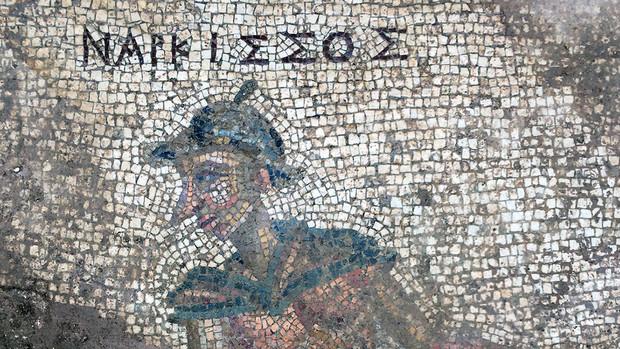 The mythological figure Narcissus appears in this detail of an ancient latrine's mosaic floor. Courtesy photo.