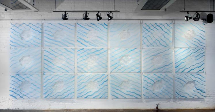 Susan Knight, Archetypal Water, 2012, 18 components of double-hung, hand-cut Mylar sheets with applied acrylic ink, 30” x 39”, installation composition and size variable.