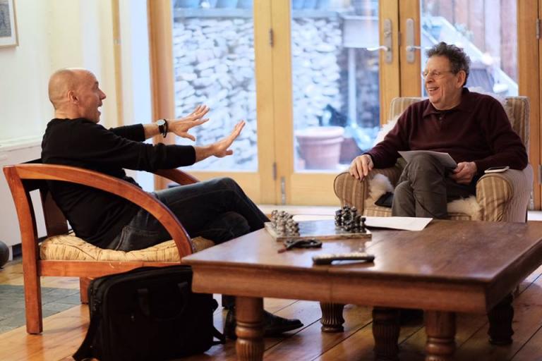 Paul Barnes (left) visits with Composer Philip Glass in New York in January. Photo by Peter Barnes/Intrepid Visuals.