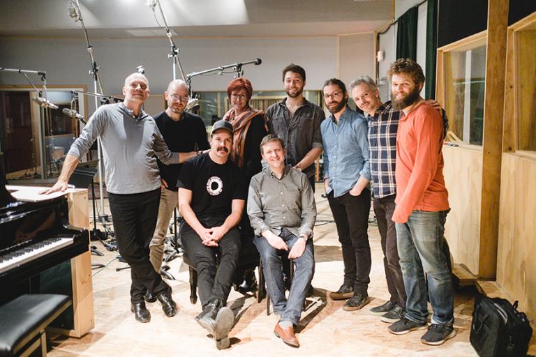 Paul Barnes (back row, left) with Brooklyn Rider, Liana Sandin (back row, third from left) and engineers from Octaven Audio during the recording of a new CD featuring the chamber music of Philip Glass. Photo by Peter Barnes, Intrepid Visuals, L.L.C.