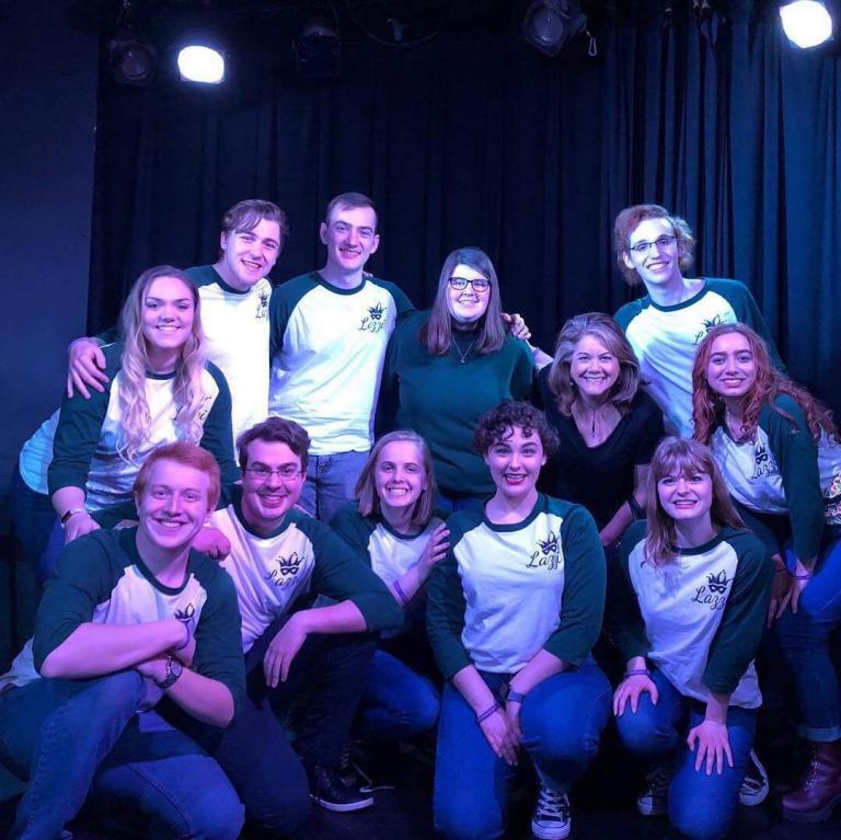 The University of Nebraska–Lincoln's Lazzi placed 2nd at the College Improv Tournament Heartland Regionals on Feb. 9 in Kansas City. Faculty advisor Julie Uribe is pictured in the back row, third from the right. Courtesy photo.