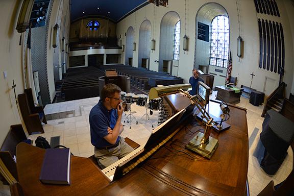 Dr. Christopher Marks, organ, and Dr. David Hall, percussion, rehearse Knecht's "Toccata, Adagio, Fugue" at First Plymouth Church in Lincoln. Photo by Michael Reinmiller.